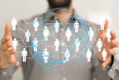 Digital illustration of hands holding a connected network and data concept for neutral host wireless infrastructure