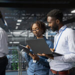 Data center recruitment strategy meeting with operations leaders planning workforce needs before an AI buildout