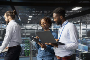 Data center recruitment strategy meeting with operations leaders planning workforce needs before an AI buildout