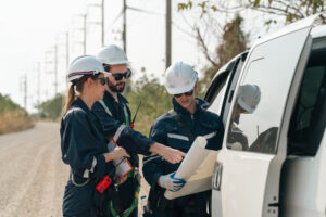 OSP construction manager coordinating fiber construction crews during an outside plant build