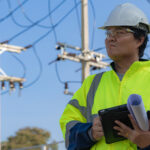 OSP engineer reviewing fiber broadband plans for design, permitting, and field construction support