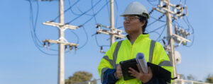 OSP engineer reviewing fiber broadband plans for design, permitting, and field construction support