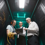 Data center operations and commissioning team reviewing facility readiness before go-live