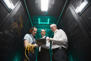Data center operations and commissioning team reviewing facility readiness before go-live