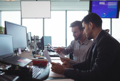 Wireless operations leaders reviewing a network deployment plan