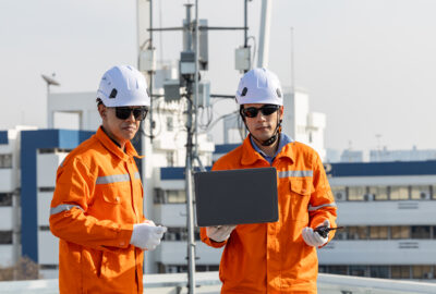 Wireless engineers planning a mid-band spectrum deployment near cellular network equipment