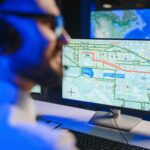 OSP network planner reviewing fiber routes and construction plans before crews begin deployment