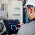 Engineer monitoring 5G RedCap devices for an industrial IoT network