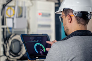 Engineer monitoring 5G RedCap devices for an industrial IoT network