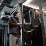 Data center retrofit staffing team reviewing AI-ready power and cooling upgrades