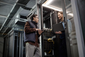 Data center retrofit staffing team reviewing AI-ready power and cooling upgrades