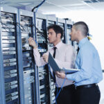 Director of data center operations reviewing uptime and critical infrastructure