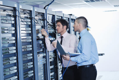 Director of data center operations reviewing uptime and critical infrastructure