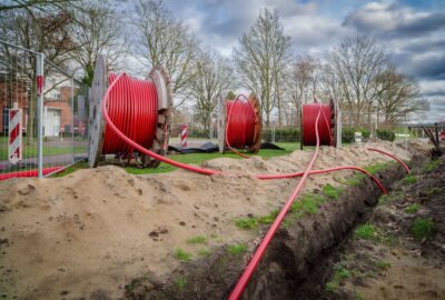 Long-haul underground fiber construction with OSP crews and conduit installation