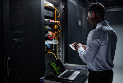 Data center field services technician providing hands-on technical support